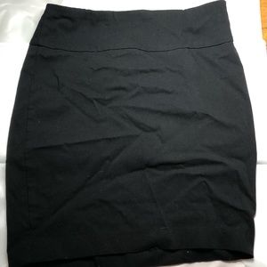 Black pencil skirt, very neutral and chic.